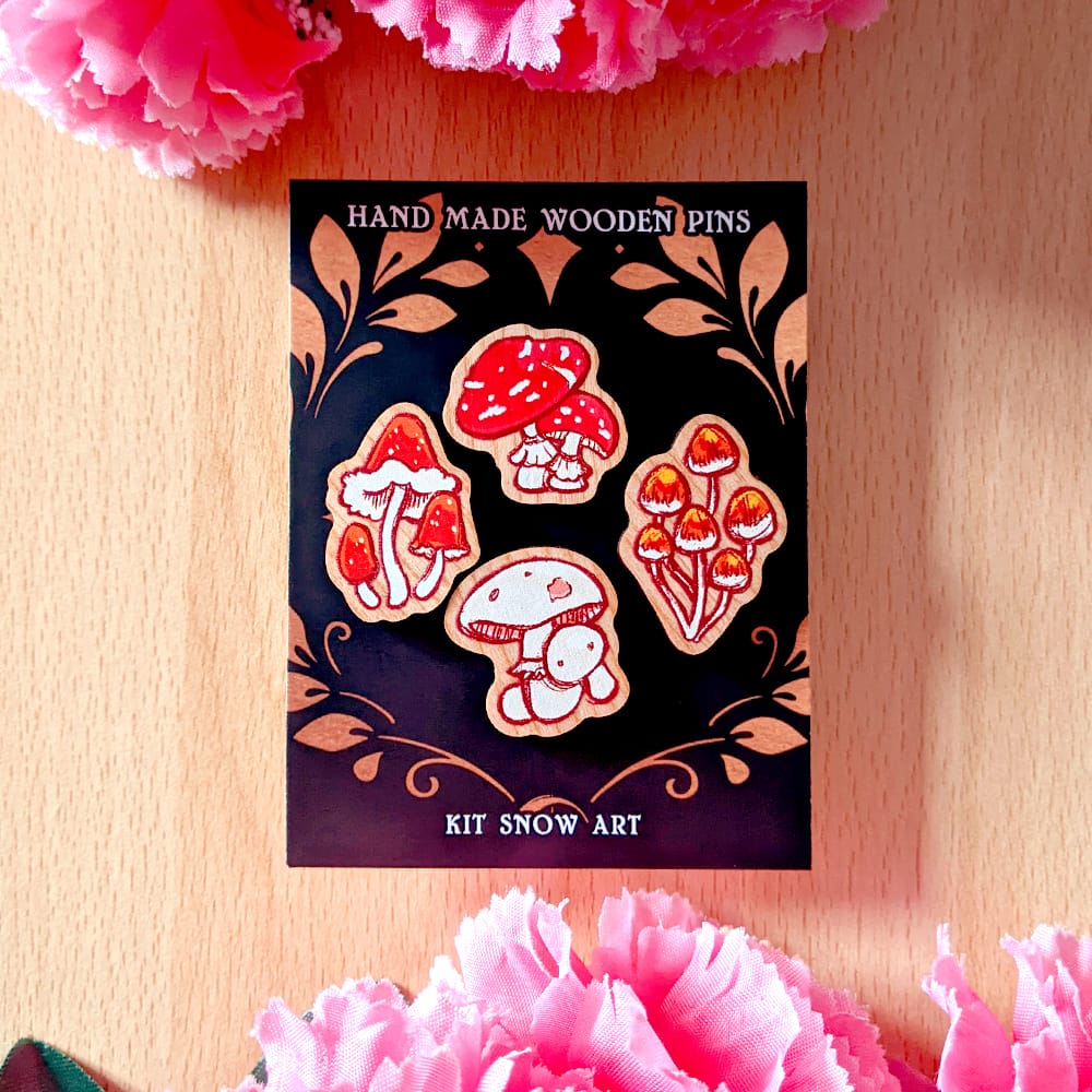 Photo of a set of 4 mushroom wooden pins